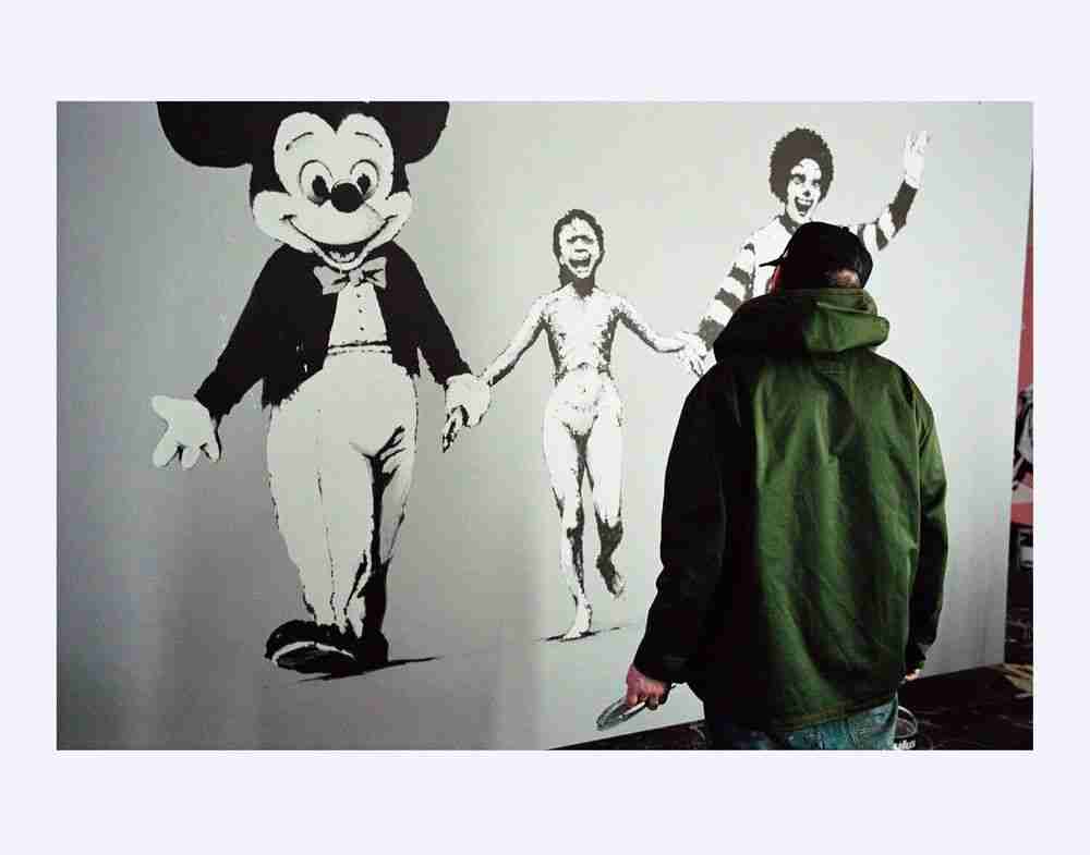 James Pfaff, ‘Banksy, Painting The Canvas Session, (2), London, 2004’, 2022, Print, Archival Fujicolor C-Type handprint, glossy. (From the original negatives), Self-released, Numbered